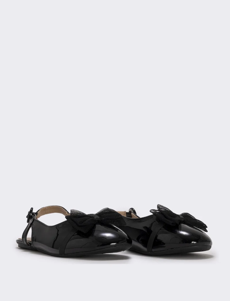 Slingback con fiocco in tulle da bambina. - Nero
