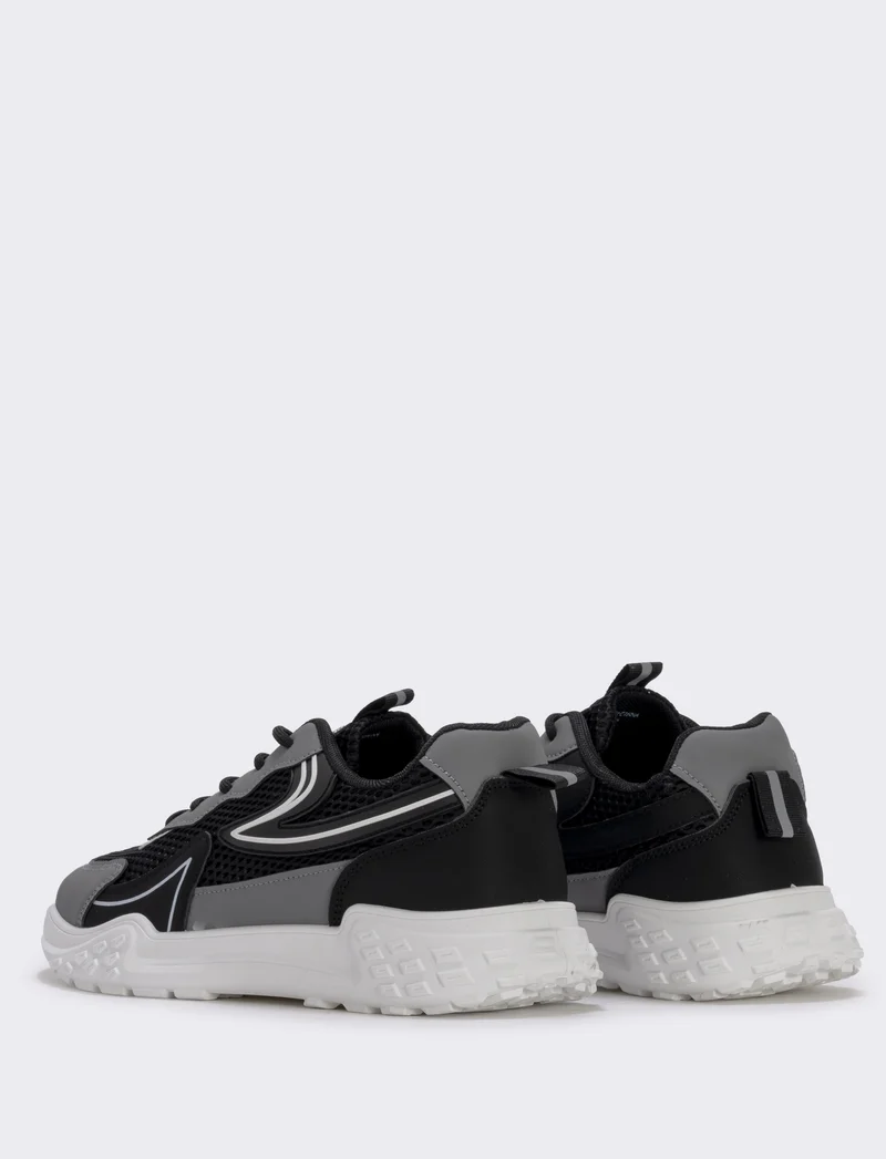 Sneakers da uomo in tessuto nero e track - Nero