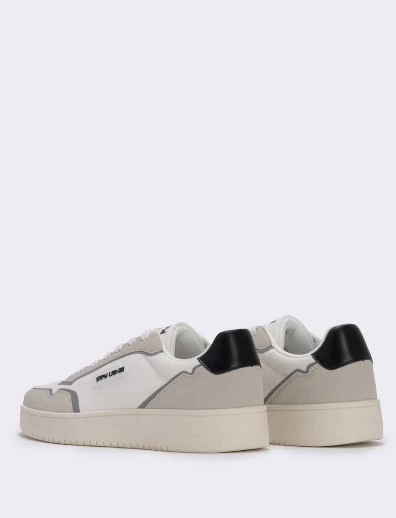 Sneakers uomo in canvas bianco e poliuretano - Bianco