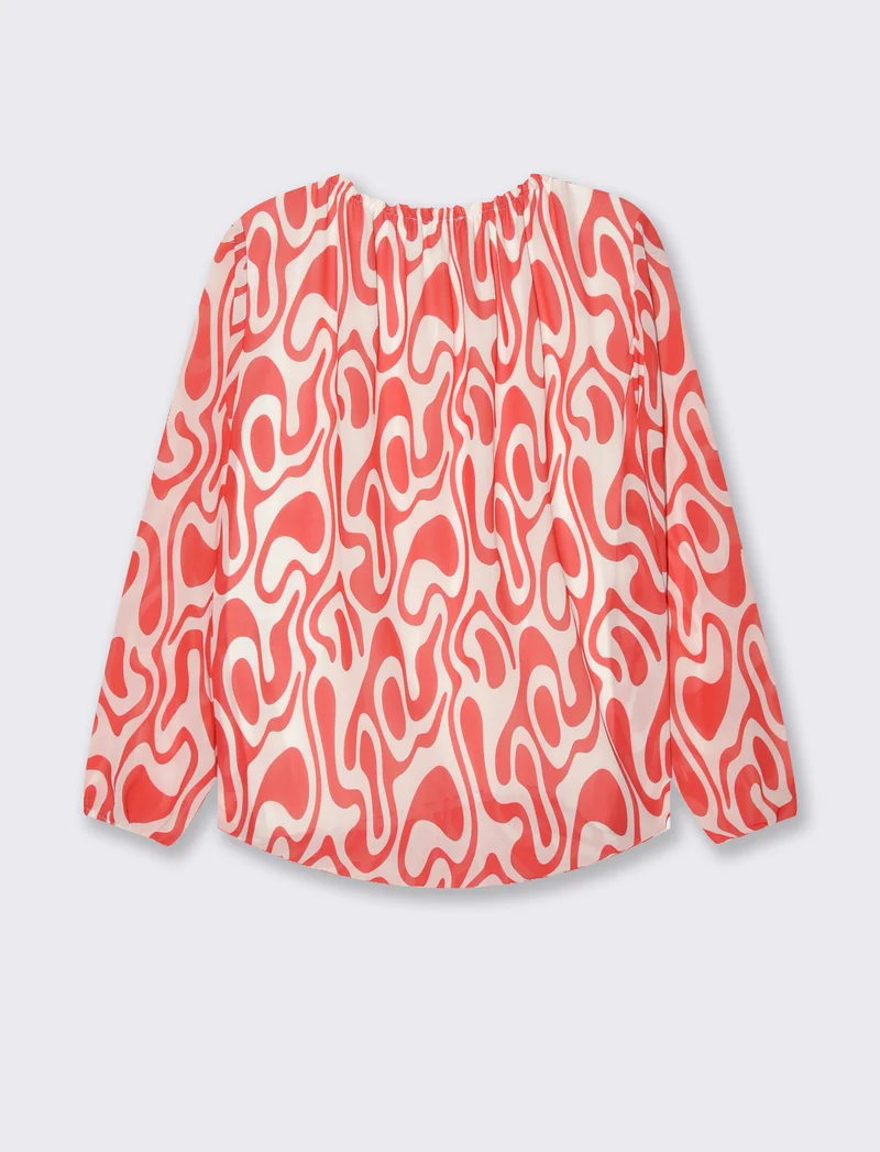 Blusa ampia in tessuto leggero con stampa e fiocco su una spalla. - Rosso