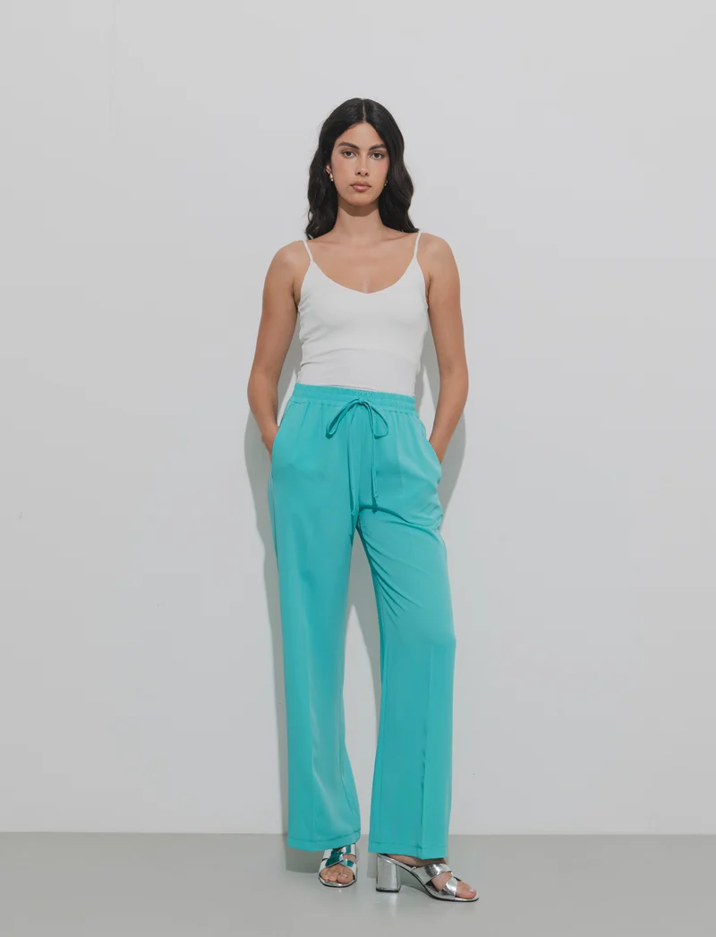 Pantalone palazzo con vita elasticizzata e coulisse regolabile. - Verde acqua