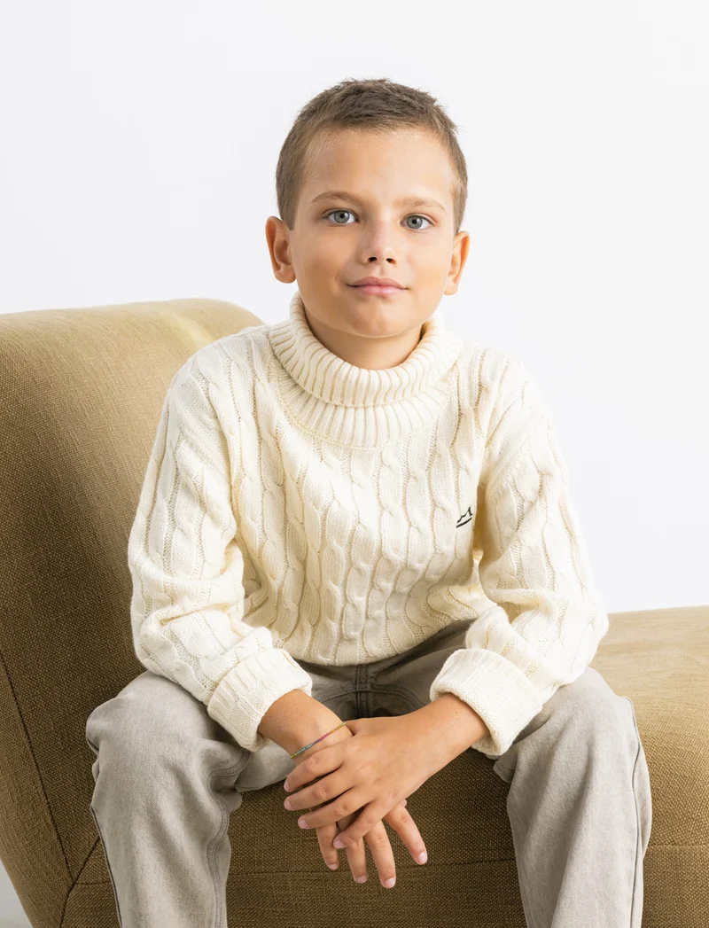 Maglia collo alto a traccia. - Beige
