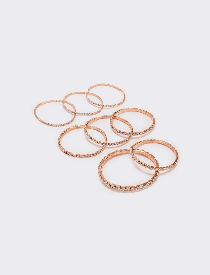 8 bracciali elastici con strass - Oro rosa