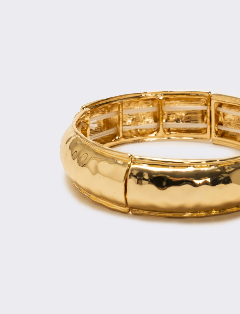 Bracciale elastico effetto martellato - Oro