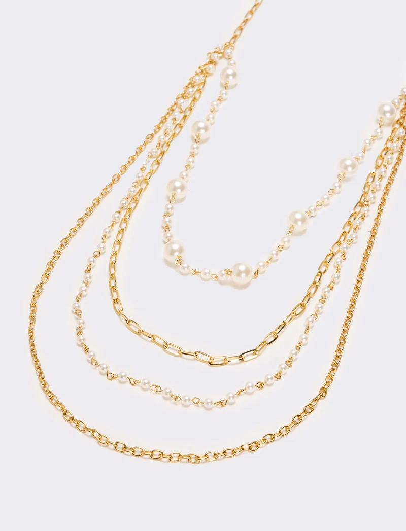 Collana con 4 catene e 2 fili di perle - Oro