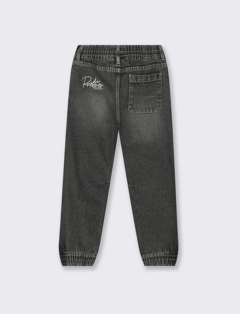 Jogging in denim. - Grigio