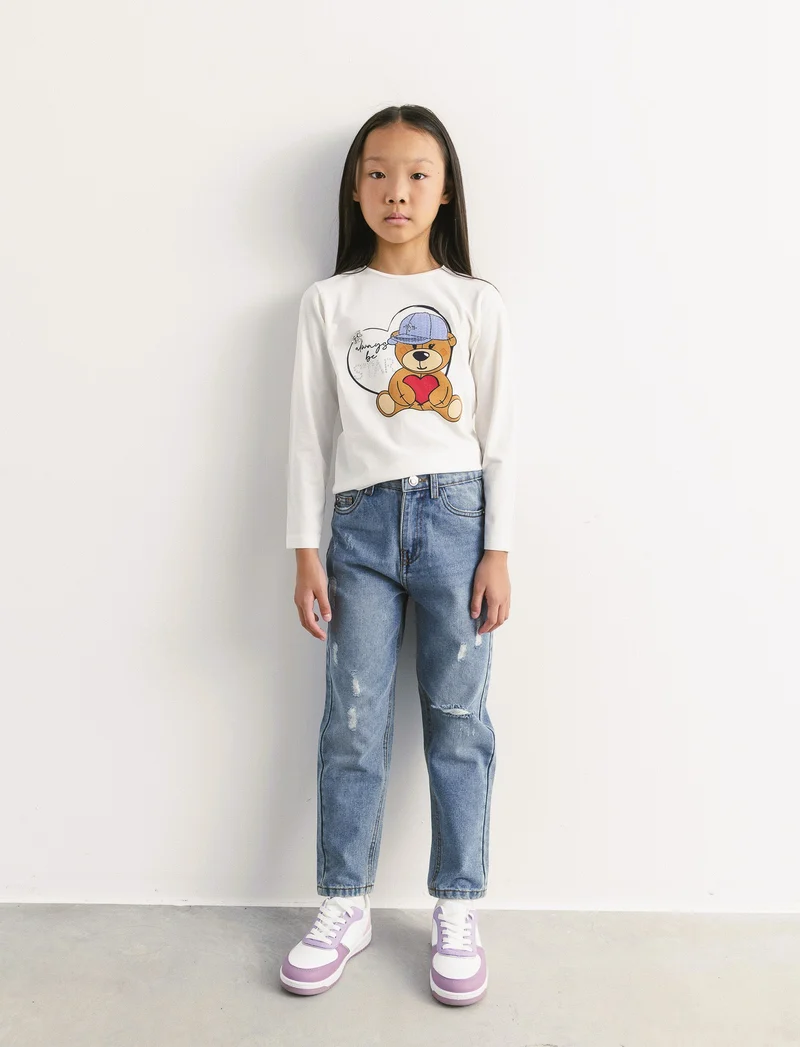 Jeans 5 tasche da bambina. - Denim