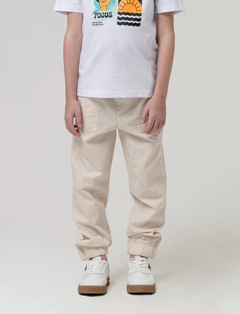 Pantalone in cotone modello cargo da bambino - Beige
