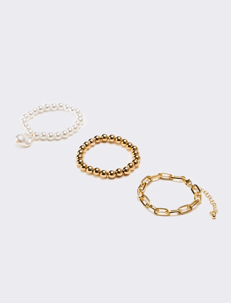 Bracciali donna 3 elastici con palline - Oro