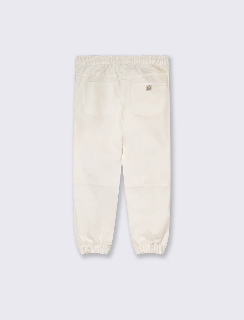 Jogger in drill di cotone da bambino - Bianco latte