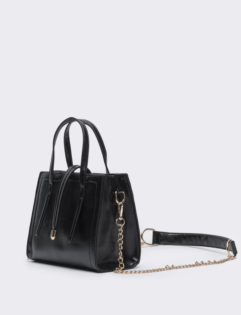Borsa semirigida a mano con laccetti - Nero
