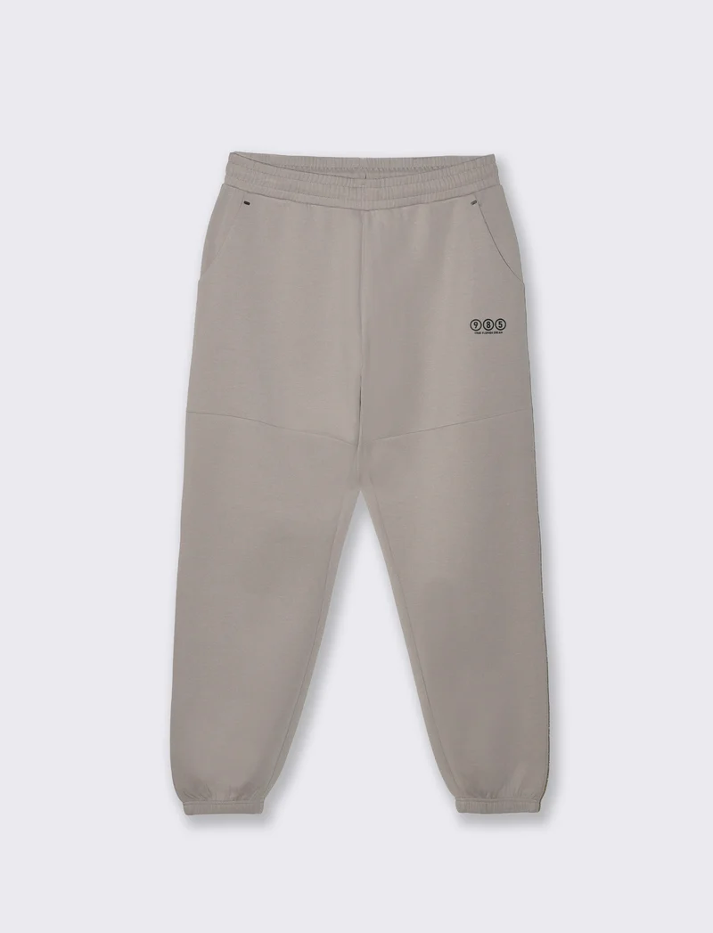 Pantaloni jogger in interlock con tasche - Sabbia