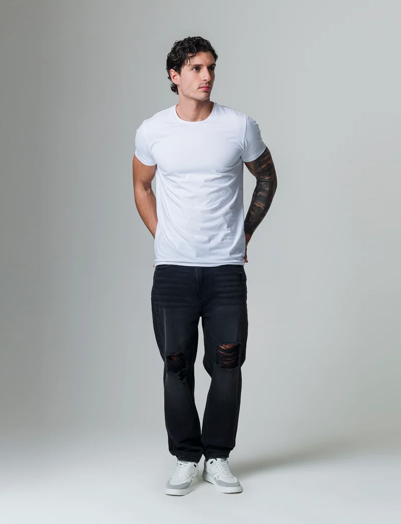 Jeans nero loose fit con strappi da uomo - Nero