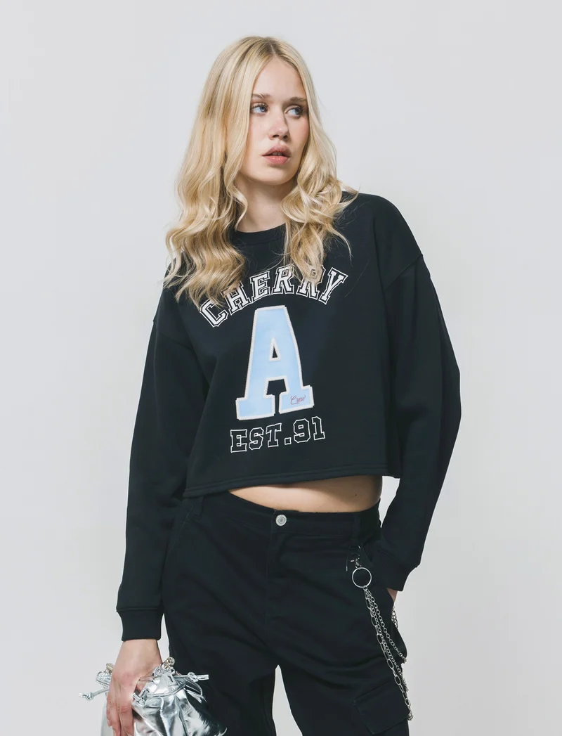 Felpa crop manica lunga con stampa - Nero
