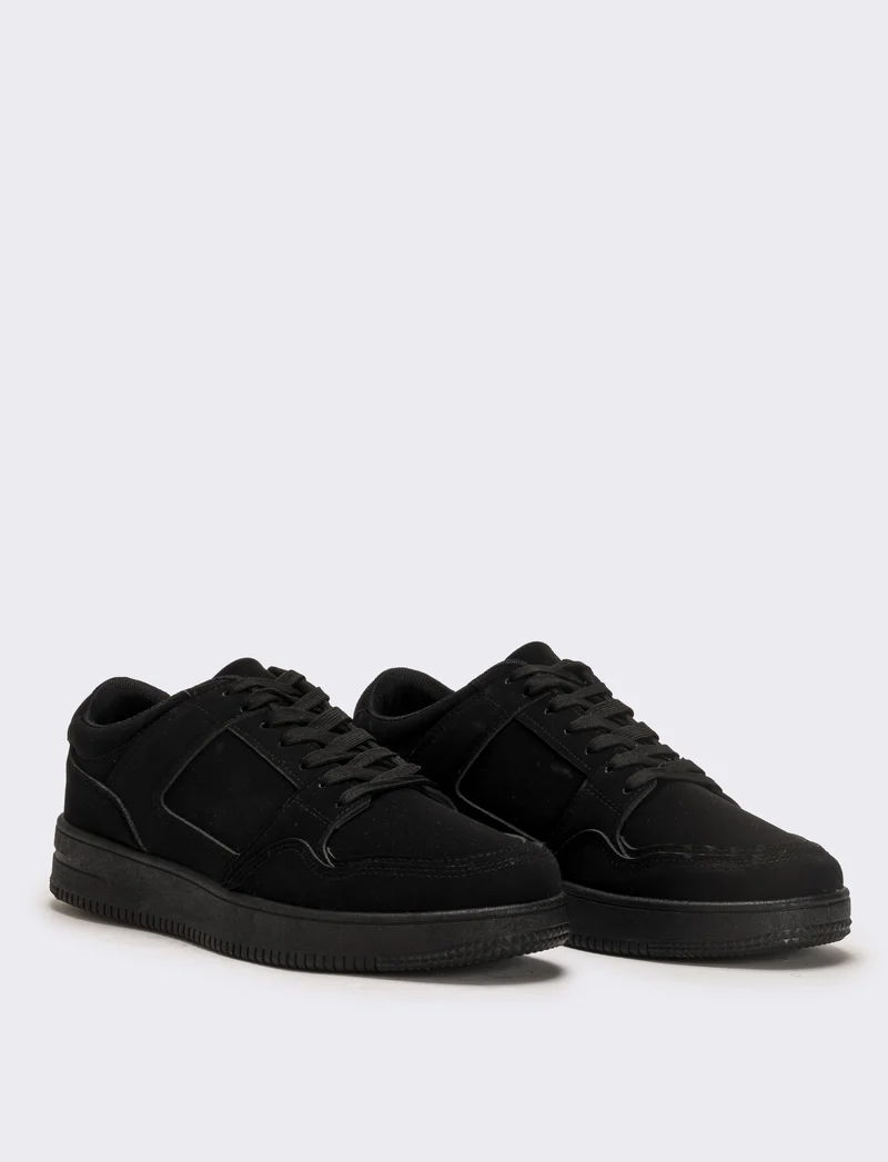 Sneakers monocolore da uomo - Nero