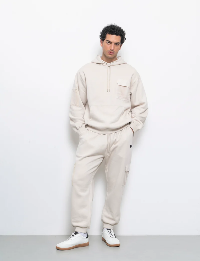 Pantaloni baggy fit in felpa con tasconi da uomo - Beige ecru
