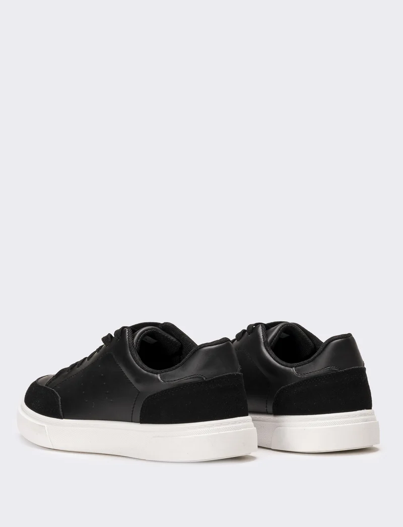 Sneakers monocolore da uomo - Nero