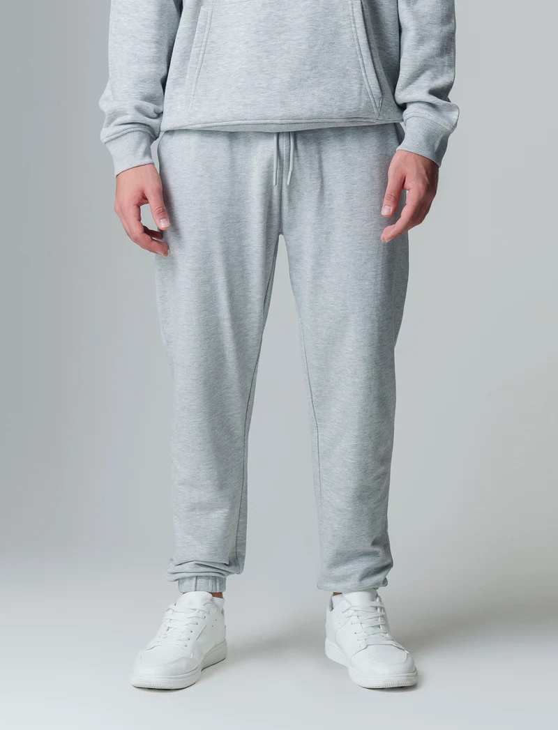 Pantaloni jogger basic in felpa da uomo - Grigio mel.